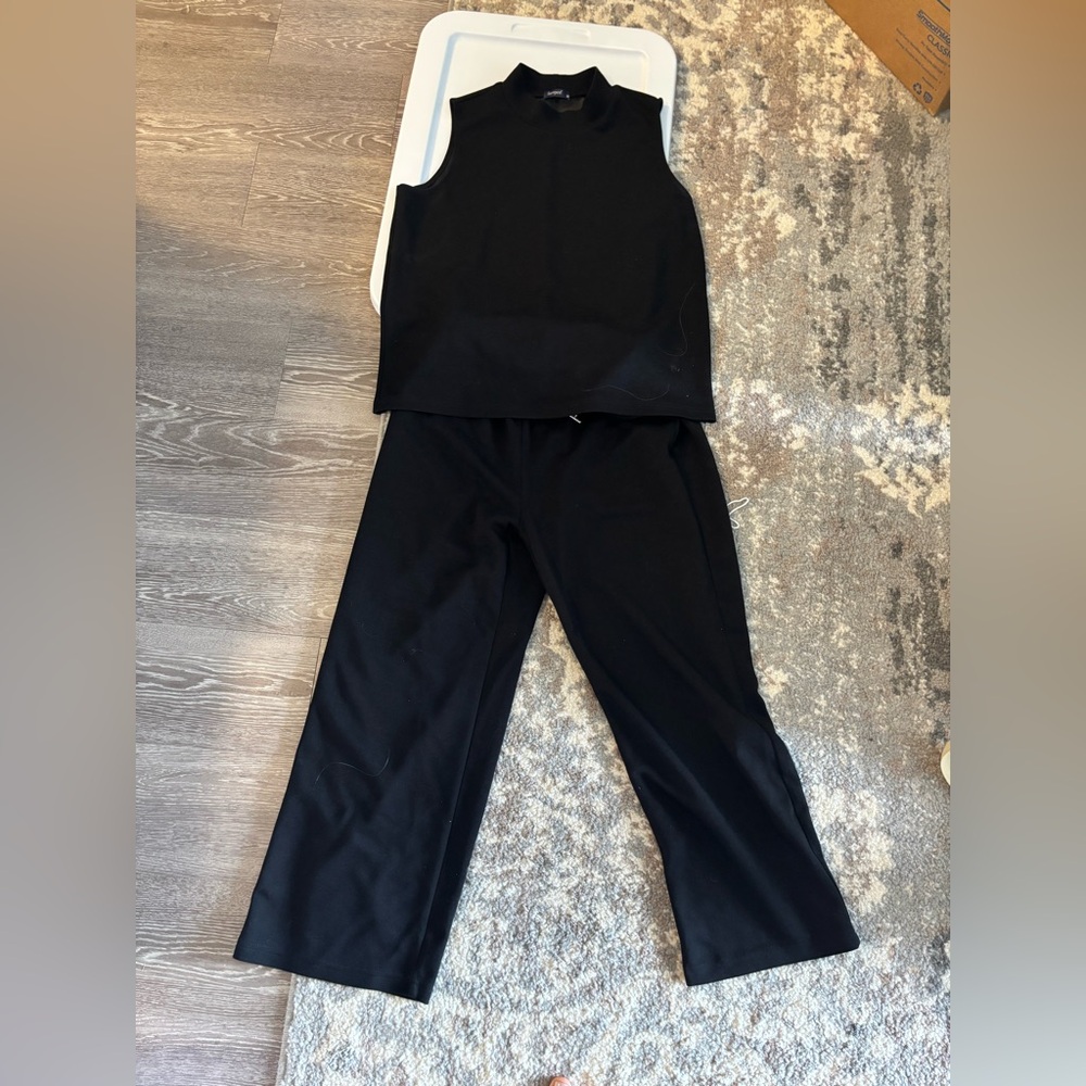 Chic Black Sleeveless two piece set. Super soft & cozy!  Non/wrinkling fabric.